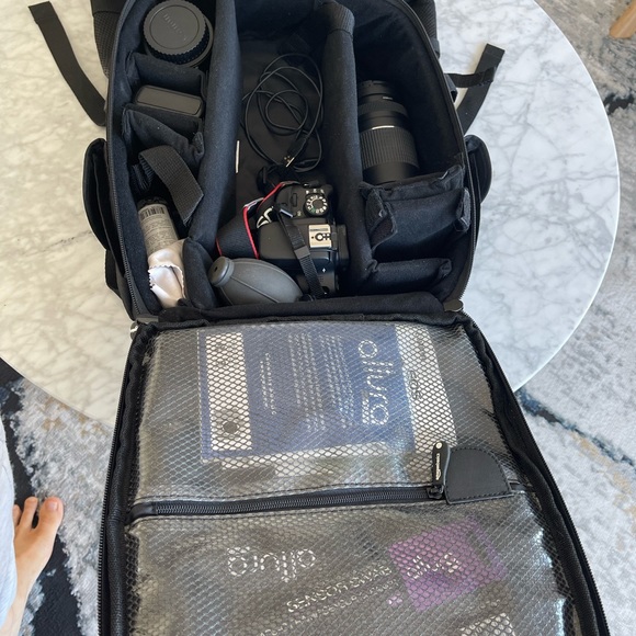 Canon Eos SL1 with case, lenses, and tripod - Picture 2 of 10